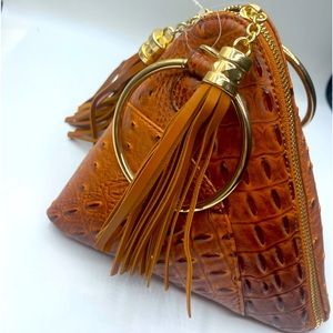 Gold handle faux crocodile purse